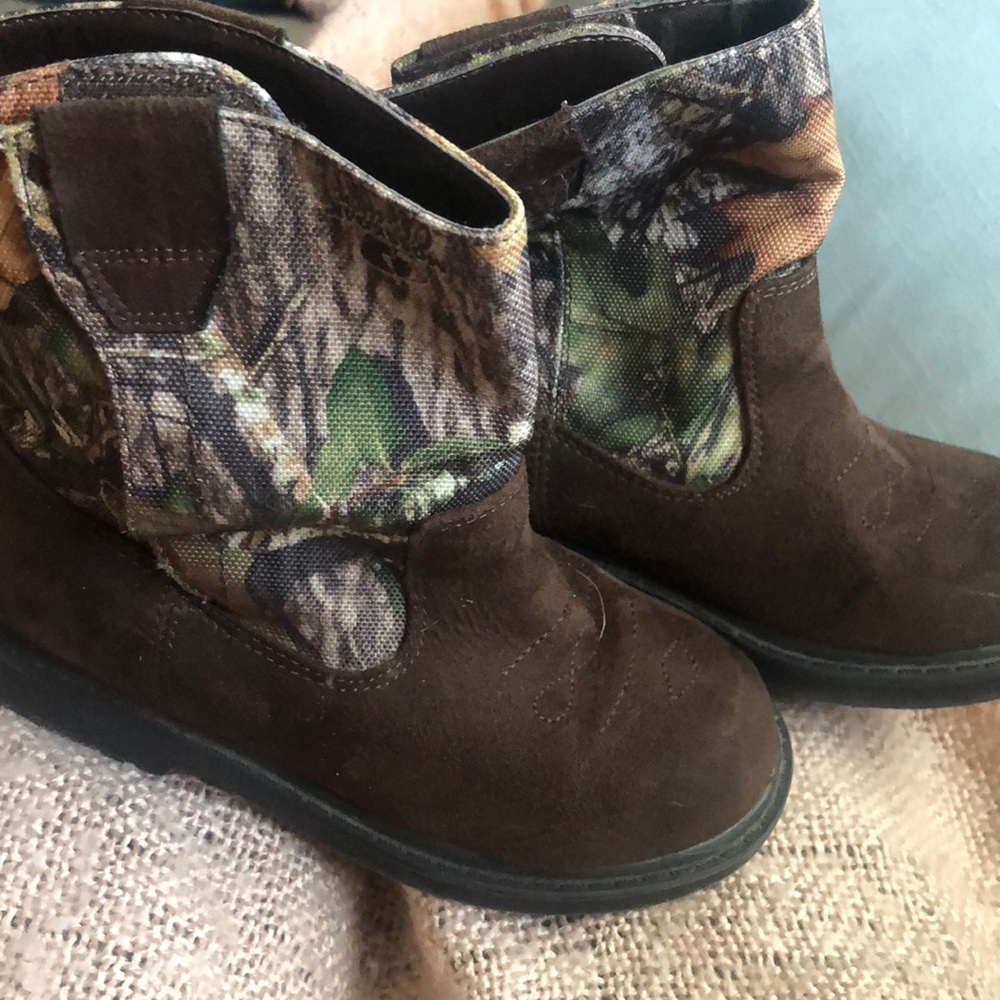Brown and camo boots